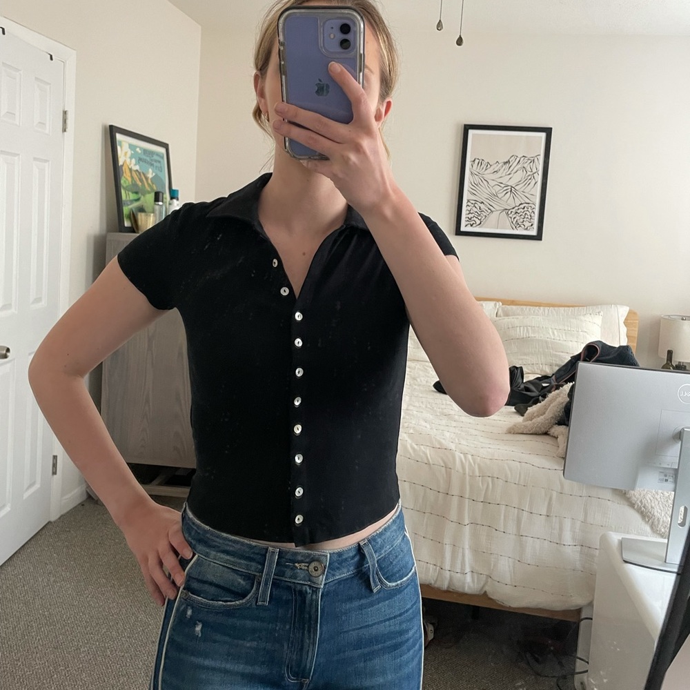 & other stories black polo w/ pearl buttons.